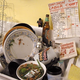 Dishes and seminal Marxist tracts pile up in the kitchen sink.